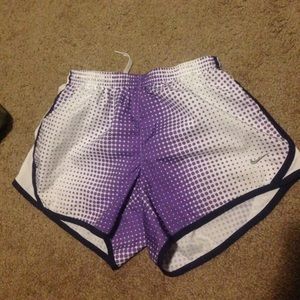 Purple Nike running shorts