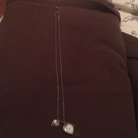 Long chain with heart clock and charm
