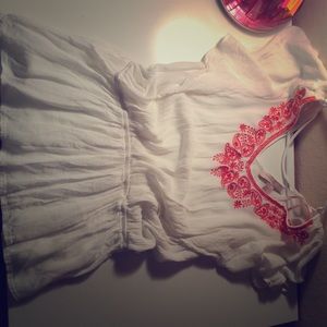 White blouse with orange detailing