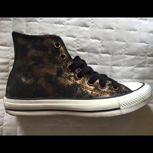 Black leather high-top converse w/ gold accent