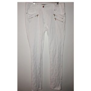 Small,all white with gold zippers and buttons,lace