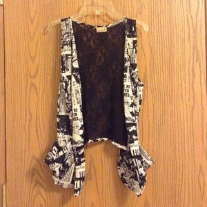 Lace and newspaper print shall