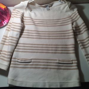 White and gold sweater