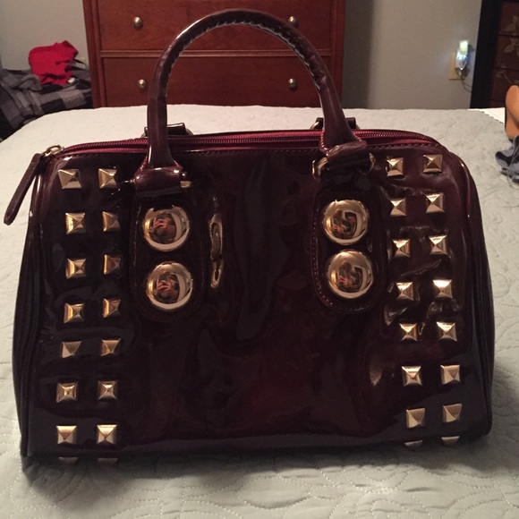 Burgundy Aldo stud patent leather handbag