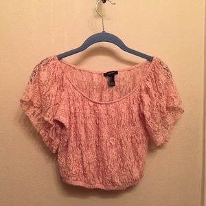 A coral/pink crop top.
