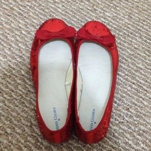 Sparkly ruby red flats.