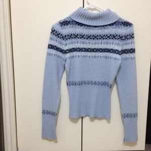 Blue sweater.