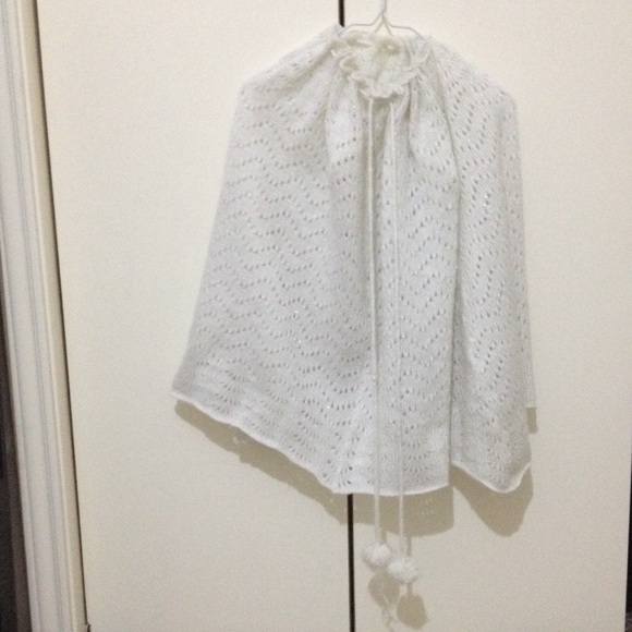 Sparkly white coverup.