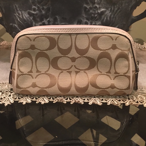 Tan coach cosmetics bag