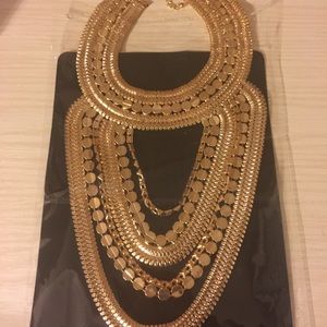 New without tag....Gold tone statement necklace.