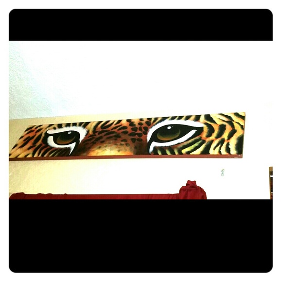 Wall mounted tiger eyes