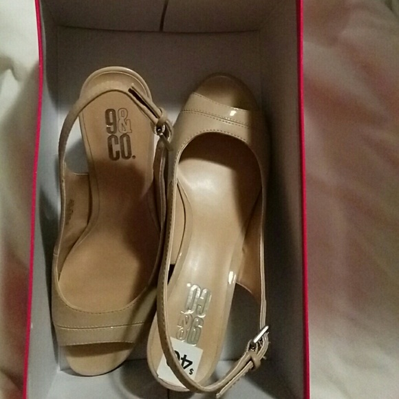 Nude open toe wedge shoes