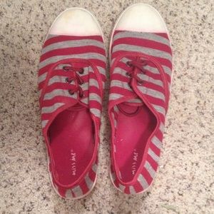 Red & grey ked shaped shoes