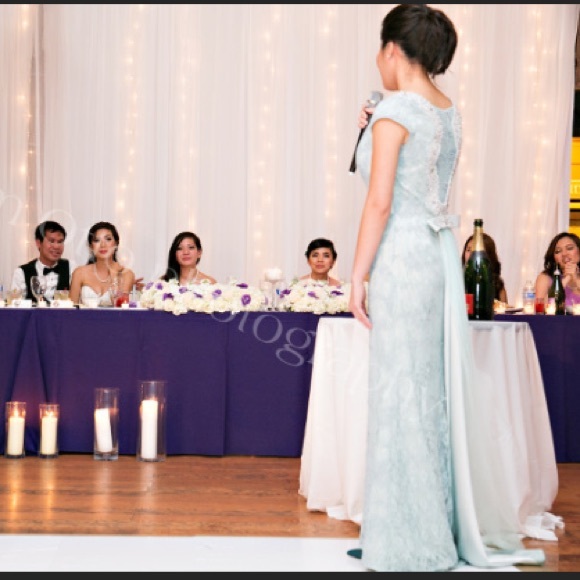 Customized designer gown with layers of long tail - Picture 4 of 4
