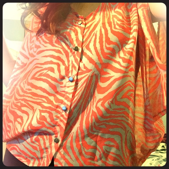 Orange zebra print top