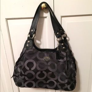 Over the shoulder black Coach purse