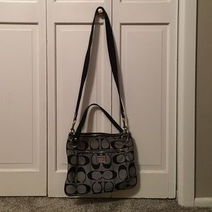 Black and silver crossbody Coach bag