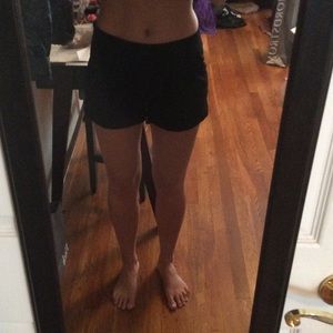 Black pleated dress shorts