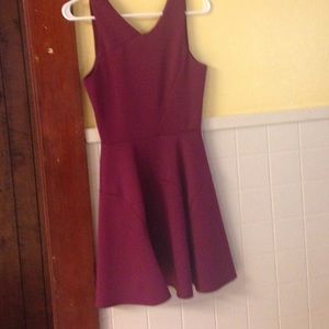 Deep purple sophisticated dress with a sharp cut