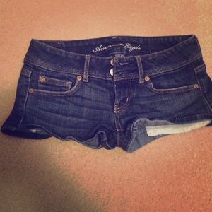 Denim shorts with button back pockets
