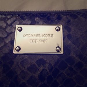 Grey and black MK wallet for credit cards/change