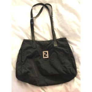 Authentic FENDI bag. Fabric with leather straps.