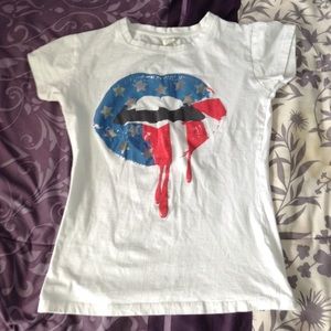 White shirt with American flag lips.
