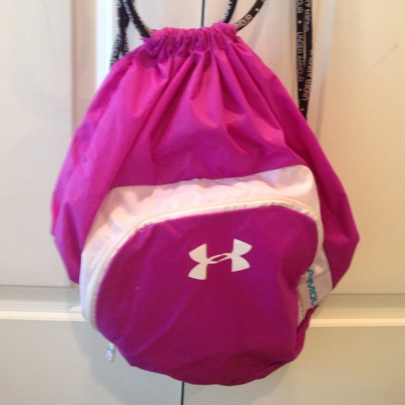 A purple and white under armor bag