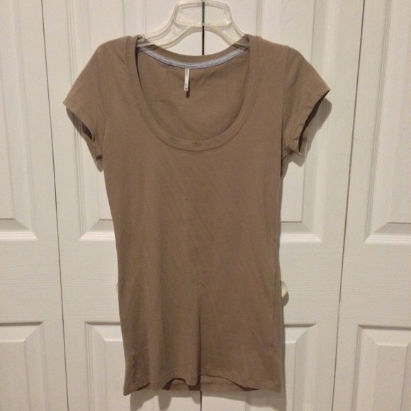 Soft, form-fitting, brown scoop neck top.