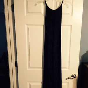 Form fitting black and blue dress.