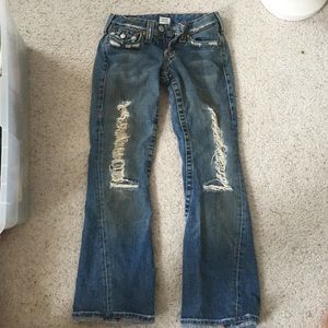 True religion ripped jeans.