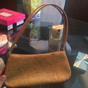 Cream leather map purse straight from Italy.