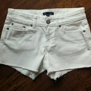 White cut-off style shorts