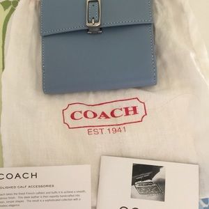 Small blue leather Coach wallet