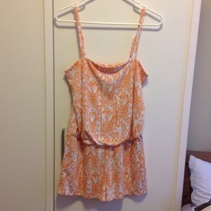 Orange and White short jumper.