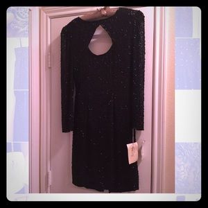 Black beaded dress brand-new never worn with tags
