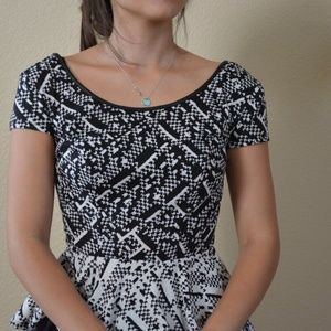 SOLD Black and Cream Peplum Top