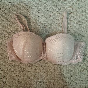 Light pink lace bra with bow in middle