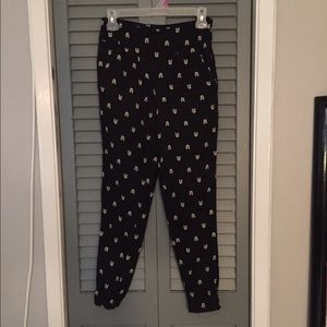 Black pants with arrows (Aztec related)