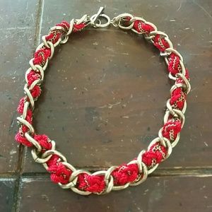 gold chain and red thread choker