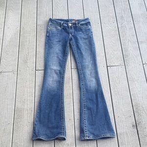 7 For All Mankind medium wash boot-cut jeans