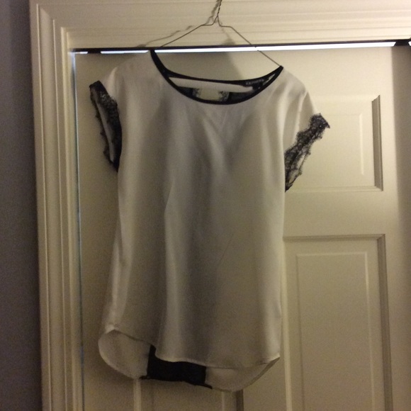 White top with black lace trim and back