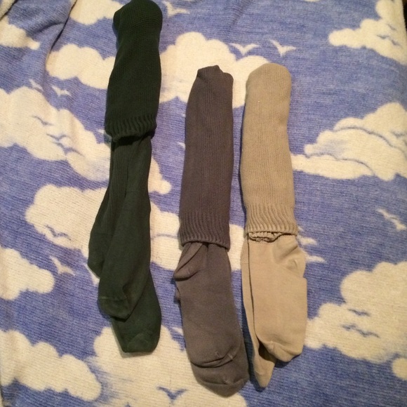 three pairs of thigh highs