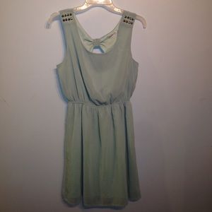 Green open back dress