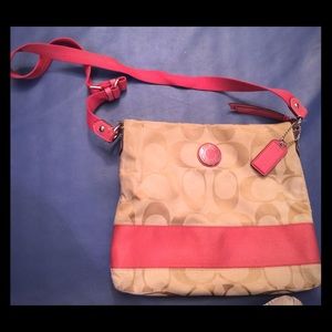 Coach peachy pink and ran cross body