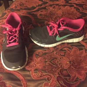 Pink and black Nike free run 3
