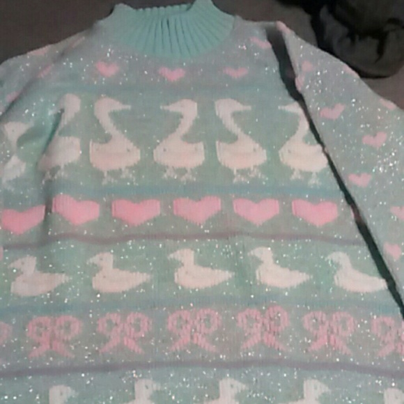 Pastel colored sparkly sweater ?