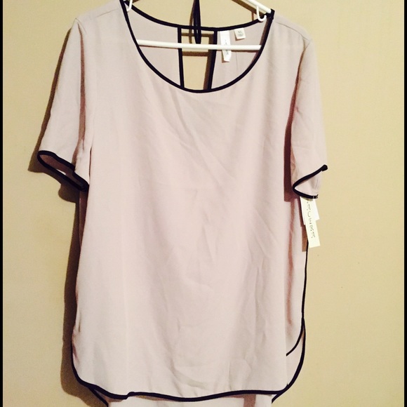Tan blouse with black outline size XL