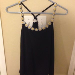 Black top with daisy straps and back