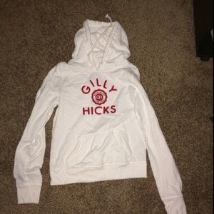 white sweatshirt and blue